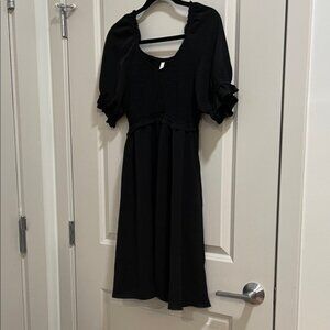 Chic Black Midi Dress with Ruffled Sleeves
